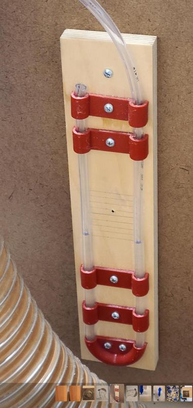 Simple brackets for tubing manometer