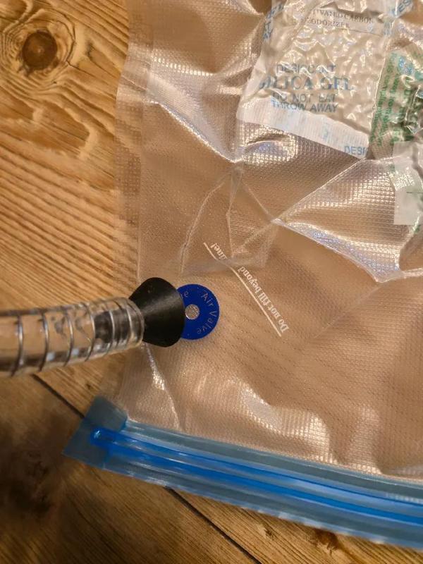 Vacuum adapter for filament bags   