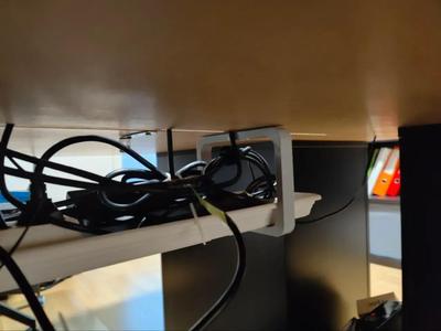 Cablemount for between two tables   