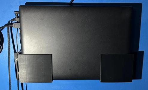 Laptop wall holder   