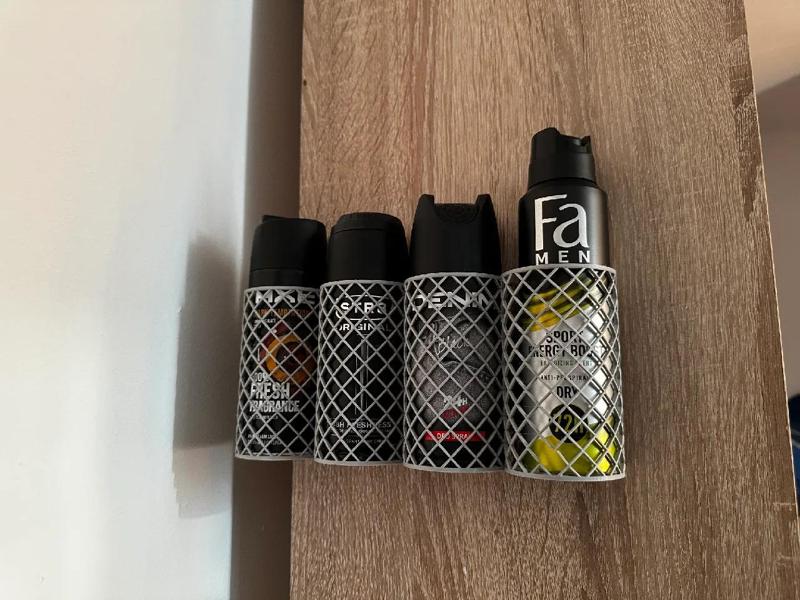 Wall mounted deodorant / can holder   