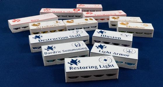 Elder Scrolls Betrayal of the Second Era dice trays with skill line logos on the lids   