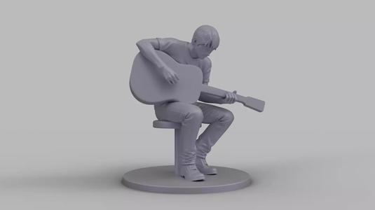 Guitar Player Figurine