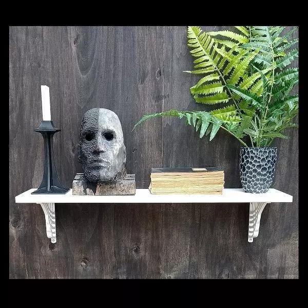 Consoles for shelves in art noveau style