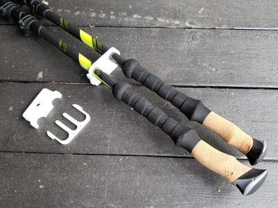 Trekking / hiking pole storage clips