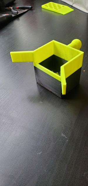 Side of desk trash bin