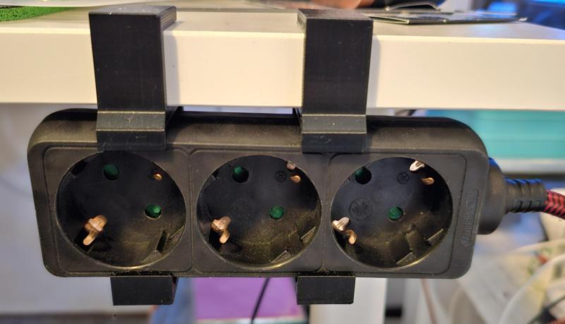 Power strip holder for (Ikea) desk. (EU/Dutch)