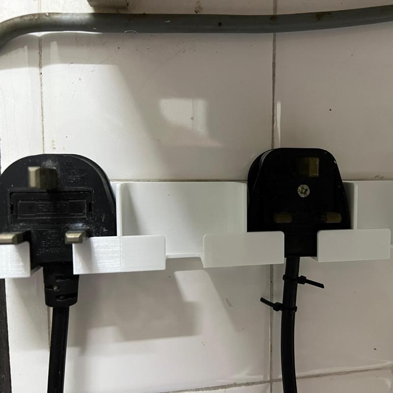 UK Plug Holder