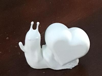 Snail with heart on its back