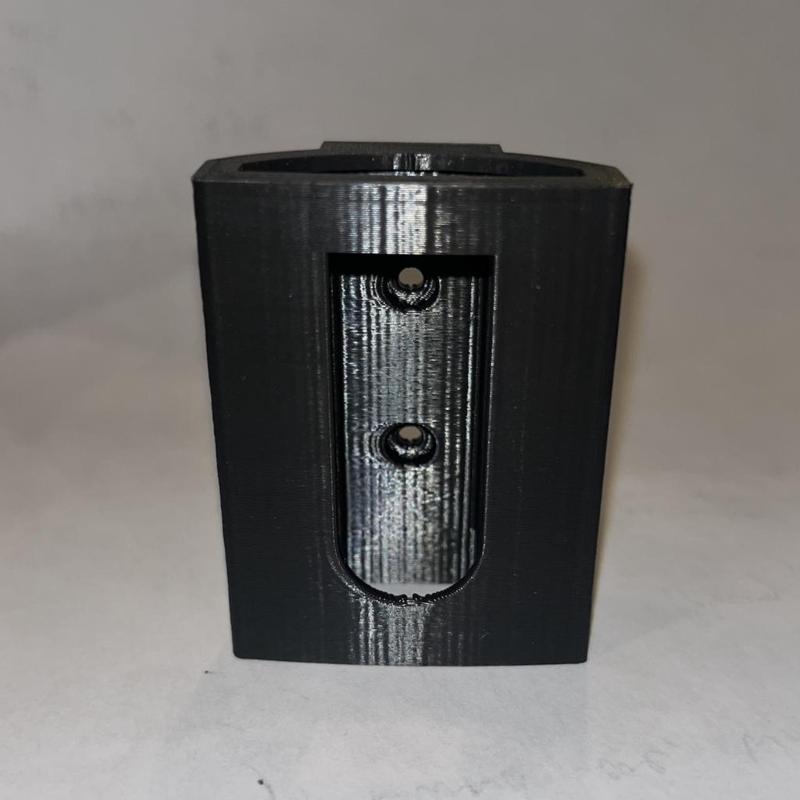 Wiz remote holder with countersunk holes