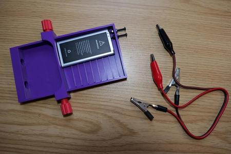 Universal phone battery charger ( for removable batteries)