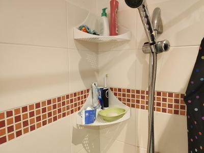 Rounded bathroom corner shelf