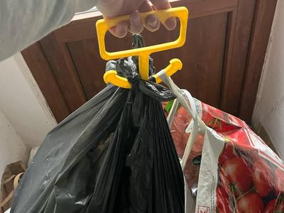 Holder, carrier for plastic bags or trash bag