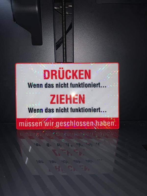 Lustiges Schild: Drücken und Ziehen...