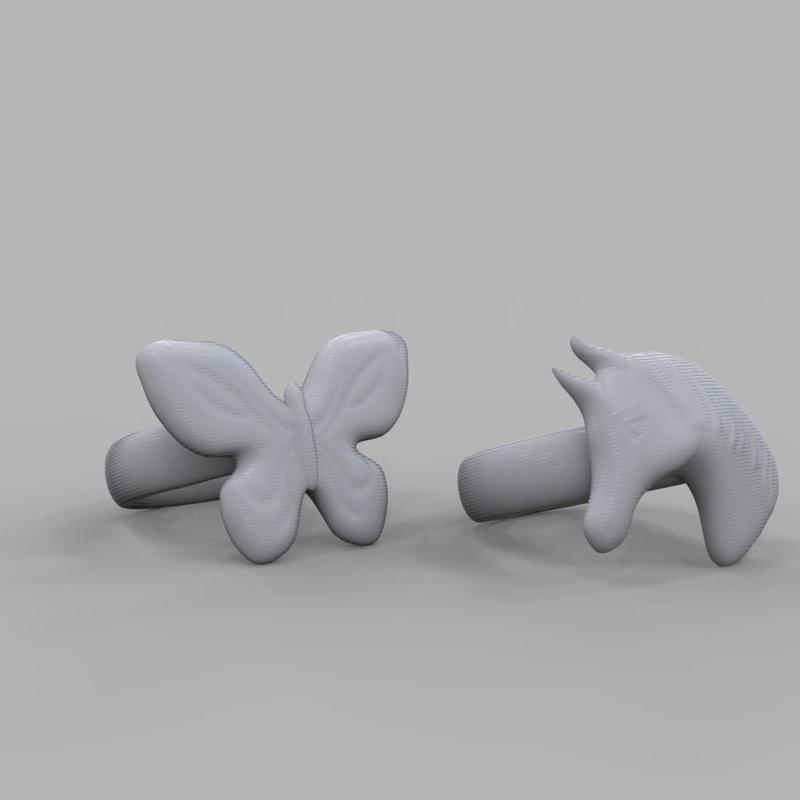 butterfly and unicorn finger rings