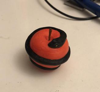 Good Omens Apple with a snake