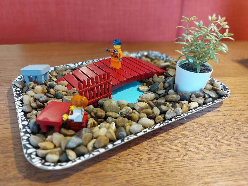 Zen garden: bridge, fence, tables and chair