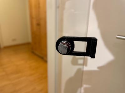 Shower door holder