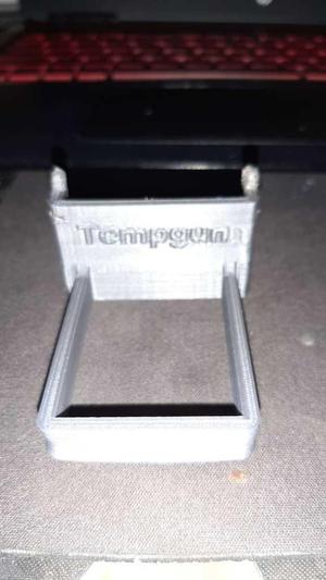 Temperature gun holster for pegboard