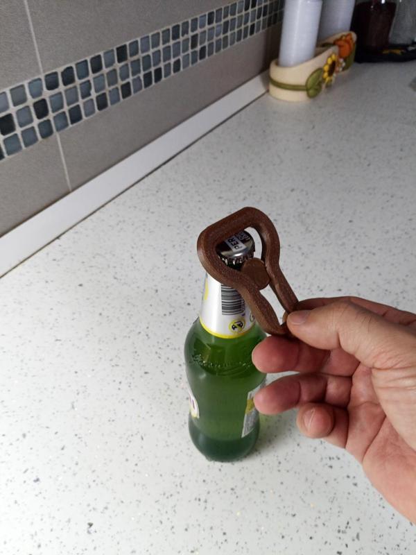 Strong keychain silhouette bottle openers