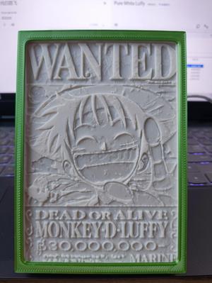 Pure white embossed photo of One Piece Luffy's Bounty, complete with matching frame