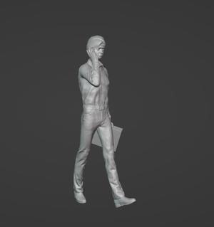 walking man with handbag talking on phone