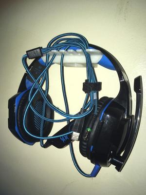 Wall Mounted Headphone hanger with Wire holder.