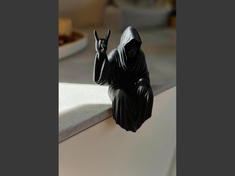 The Grim Reaper Sitting on a Shelf Rock&Roll style