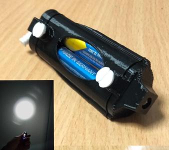 Buttonless low filament flashlight