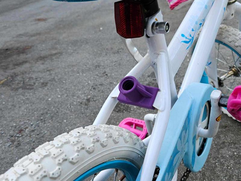 Toddler bike broom adapter.