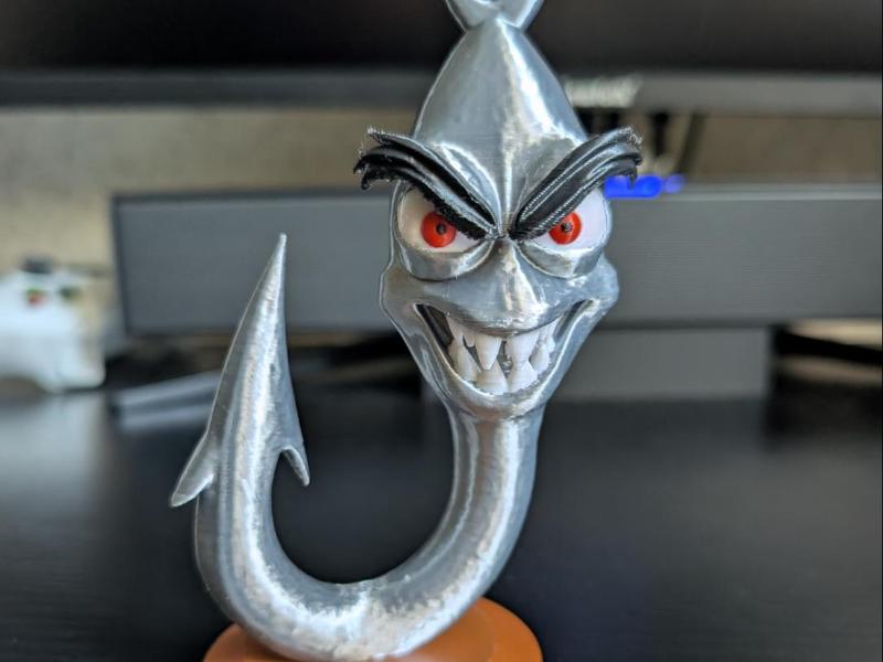 Evil Fishhook Figure