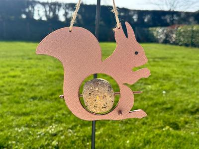 Squirrel-shaped bird feeder