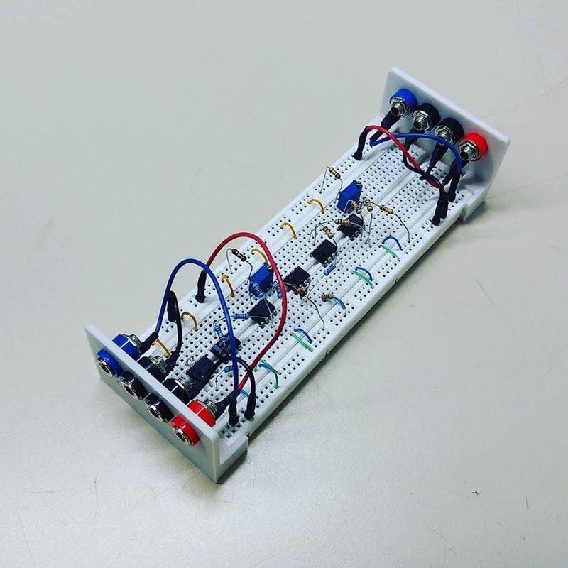 Banana jack adapter for breadboards