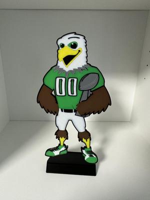 Swoop Holding Lombardi Trophy