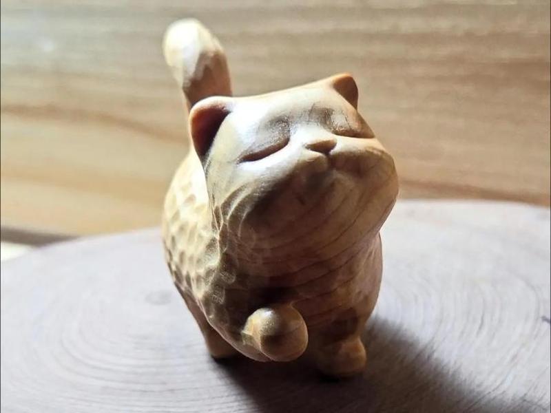 A Prideful Kitten Wood Imitation Sculpture
