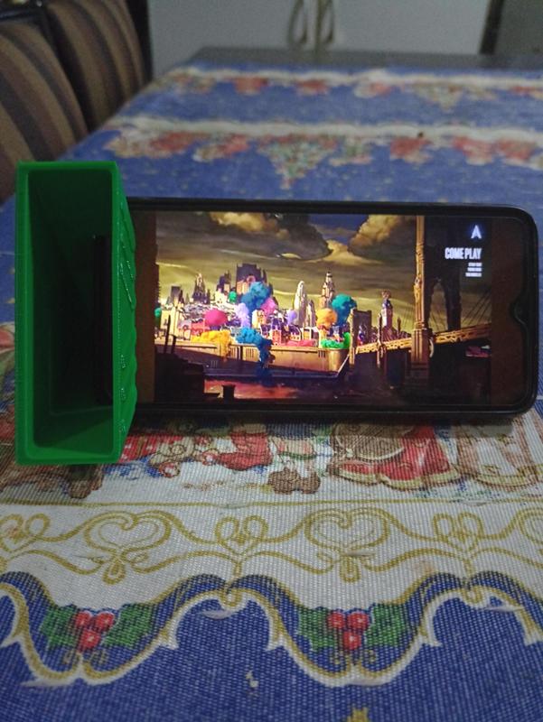 key ring Phone stand for portrait and landscape mode with acoustic amplifier / passive loudspeaker