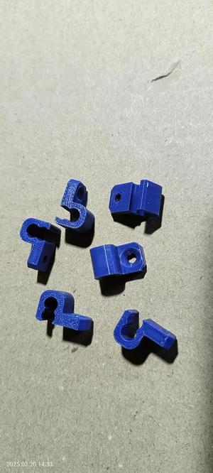 Holder for two RG-58 cables.   