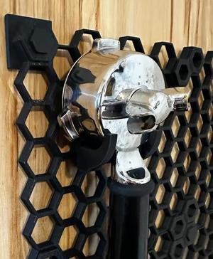 Portafilter storage hook for honeycomb wall