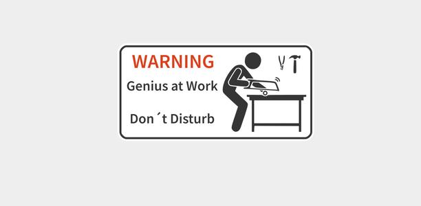 Warning-Genius at Work