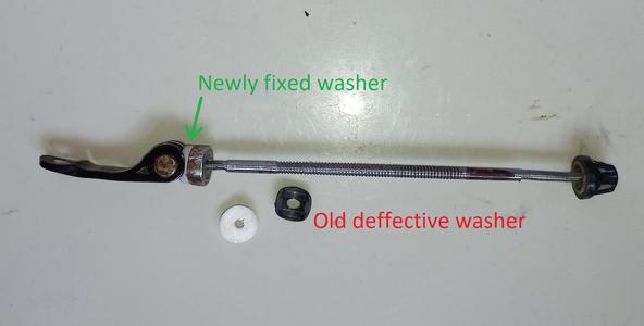 Bike fast wheel clamp repair - new plastic washer