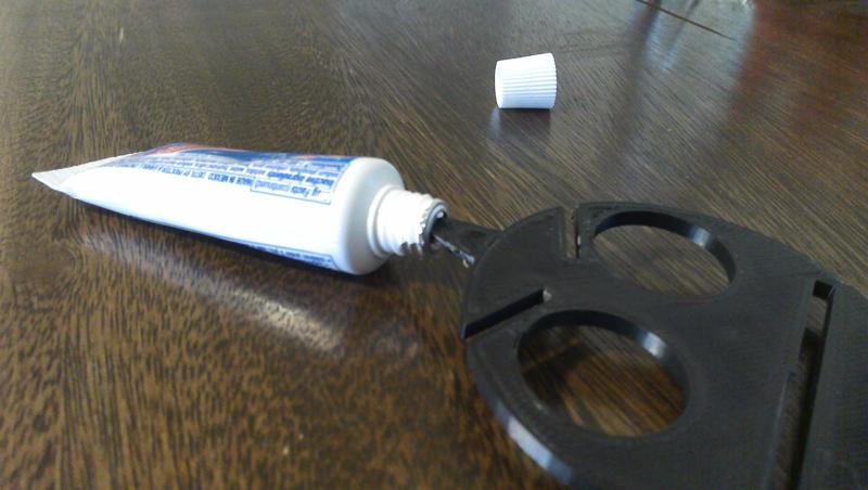 Toothpaste squeezer that open toothpaste too!