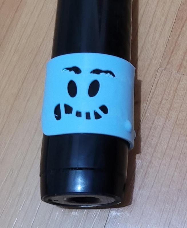 Oral-B toothbrush color ring, WEIRD SMILEY  (other emoji's and whole alphabet available)