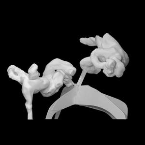 Two reclining figures on a calder base