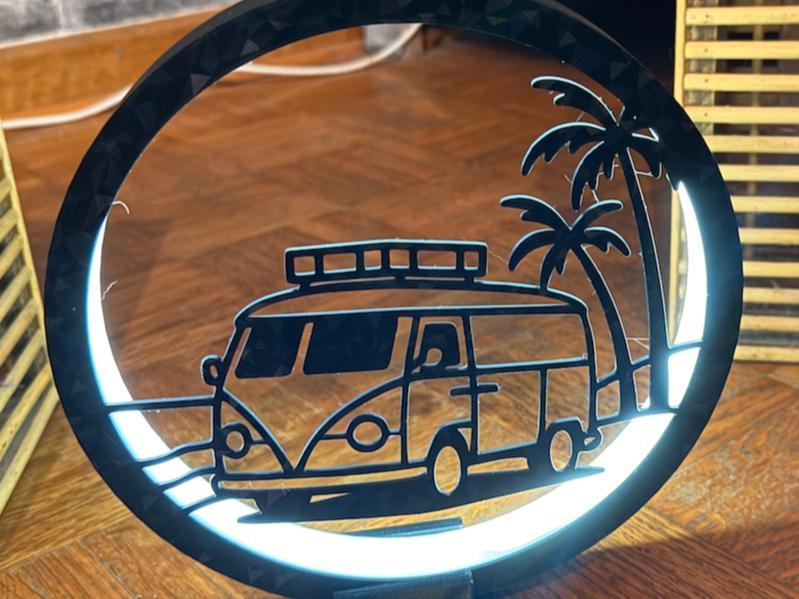 LED Ring Lamp including Frame with a Bus Motif