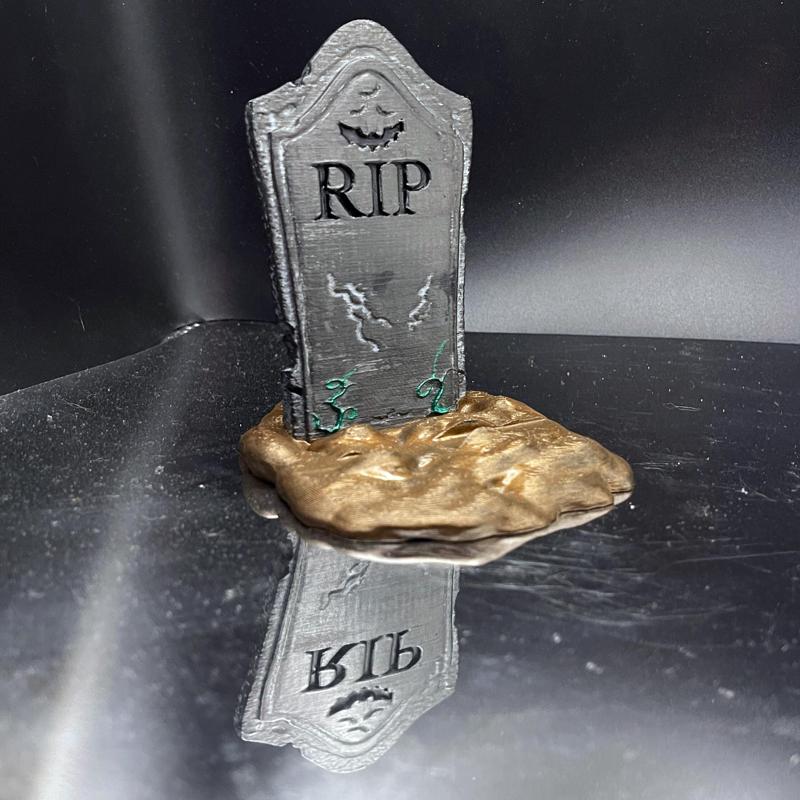Tombstone phone holder