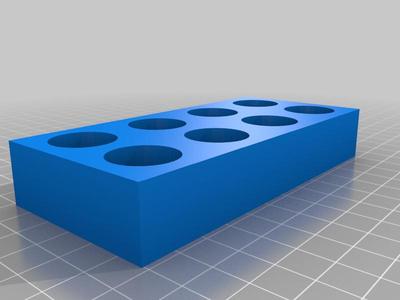 Customizable box with tapered holes in array