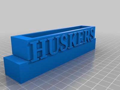 HUSKER SIGN
