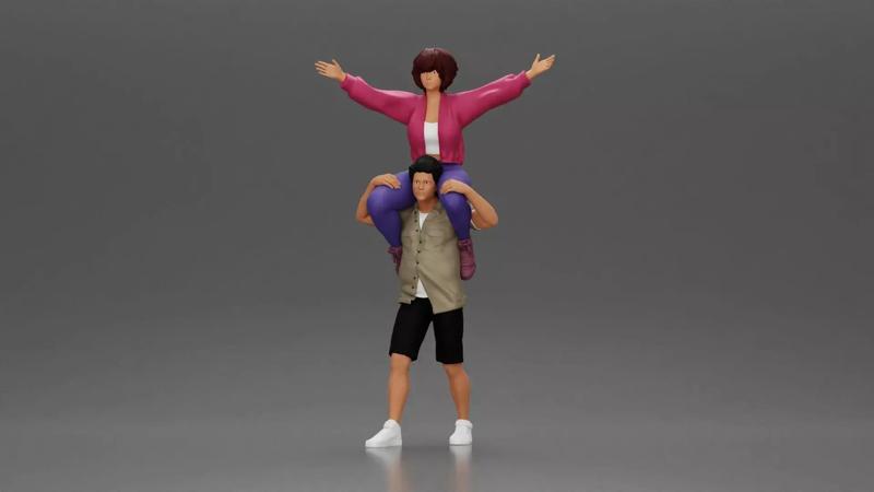 Man in shorts carrying girlfriend on shoulders