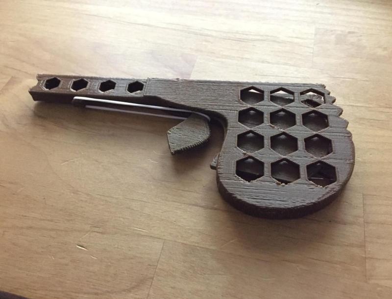 Rubbergun for children for looms printed in one piece