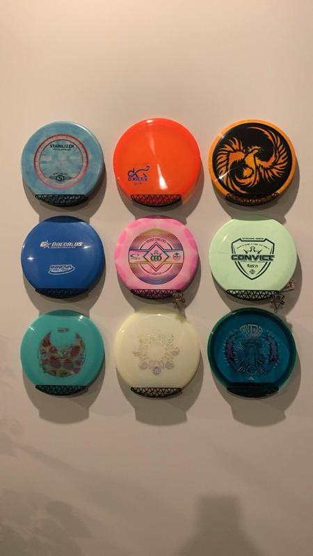 Disc golf disk wall holder